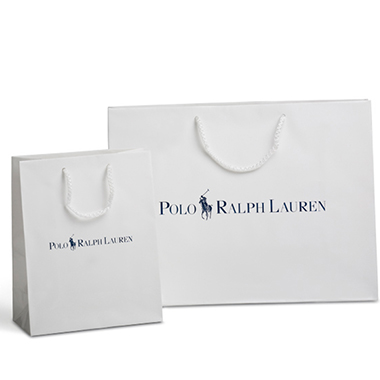 two white paper bags with handles