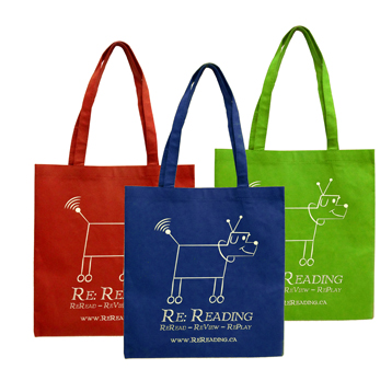 a group of colorful non-woven bags with a dog design and text on them