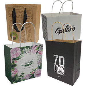 a group of paper shopping bags with different styles and designs