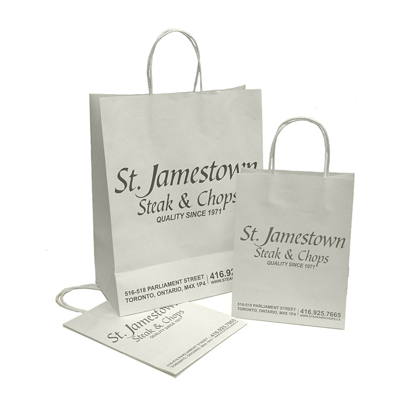 a group of white paper bags with black text
