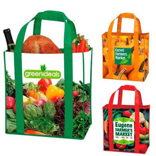 three reusable laminated non-woven grocery bags with different colours and designs
