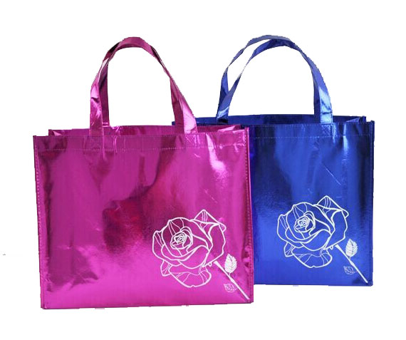 pink and blue laminated non-woven shopping bags with a rose design on them