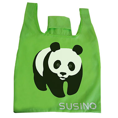 a green nylon shopping bag with a panda on it