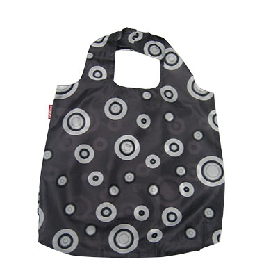 a black nylon tote bag with white circles on it