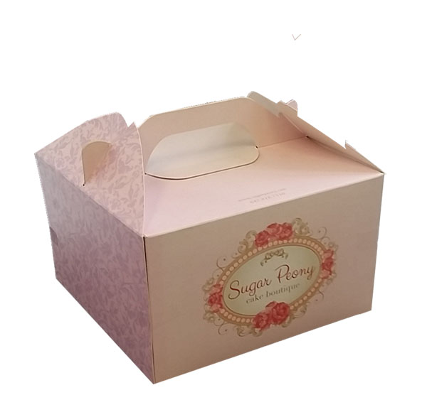 a pink gable style cake box